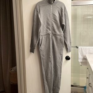 This gray jumpsuit is super warm and heavy and cozy worn once.
